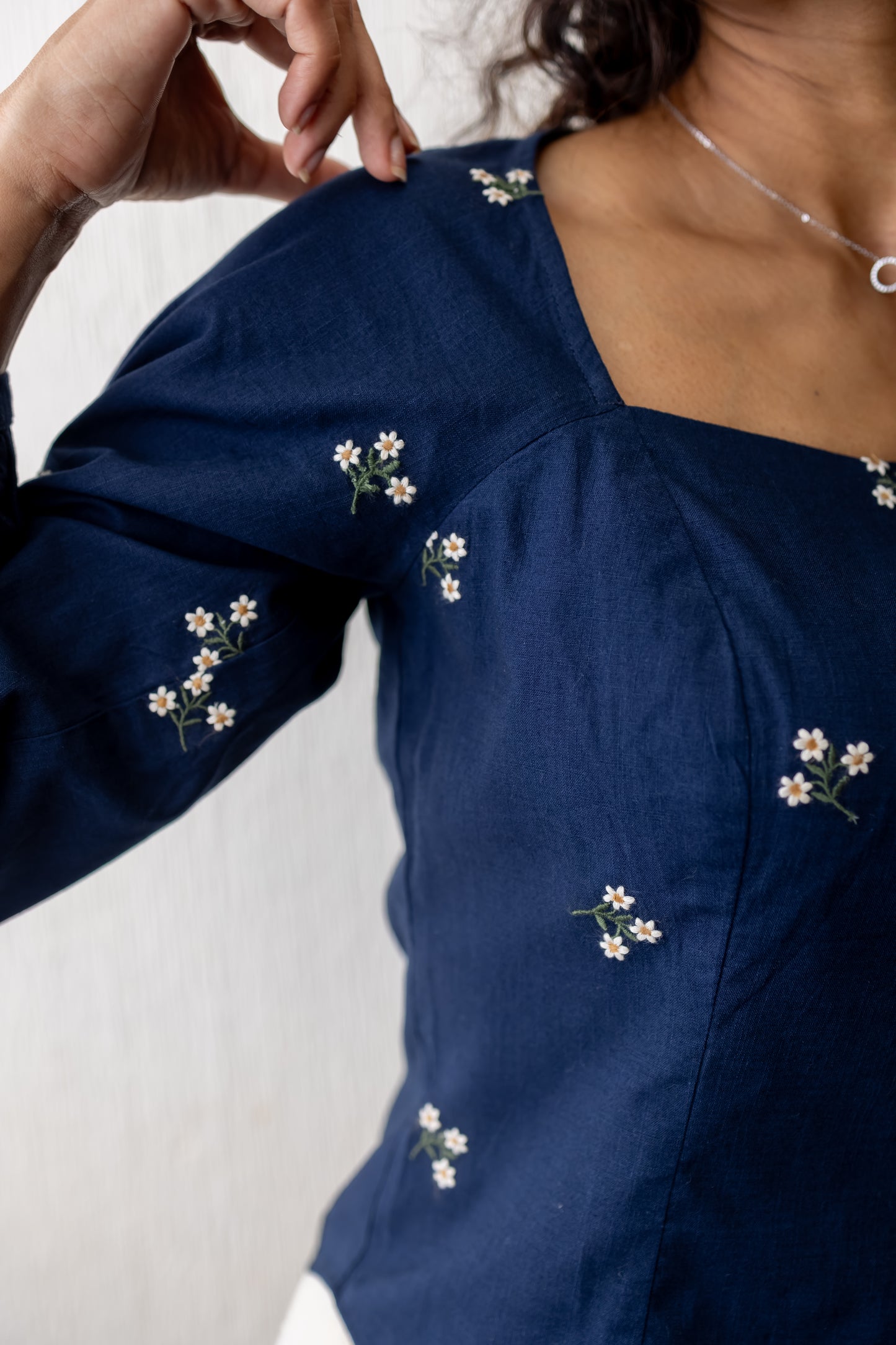 Kayla navy blue wide neck floral embroidery top