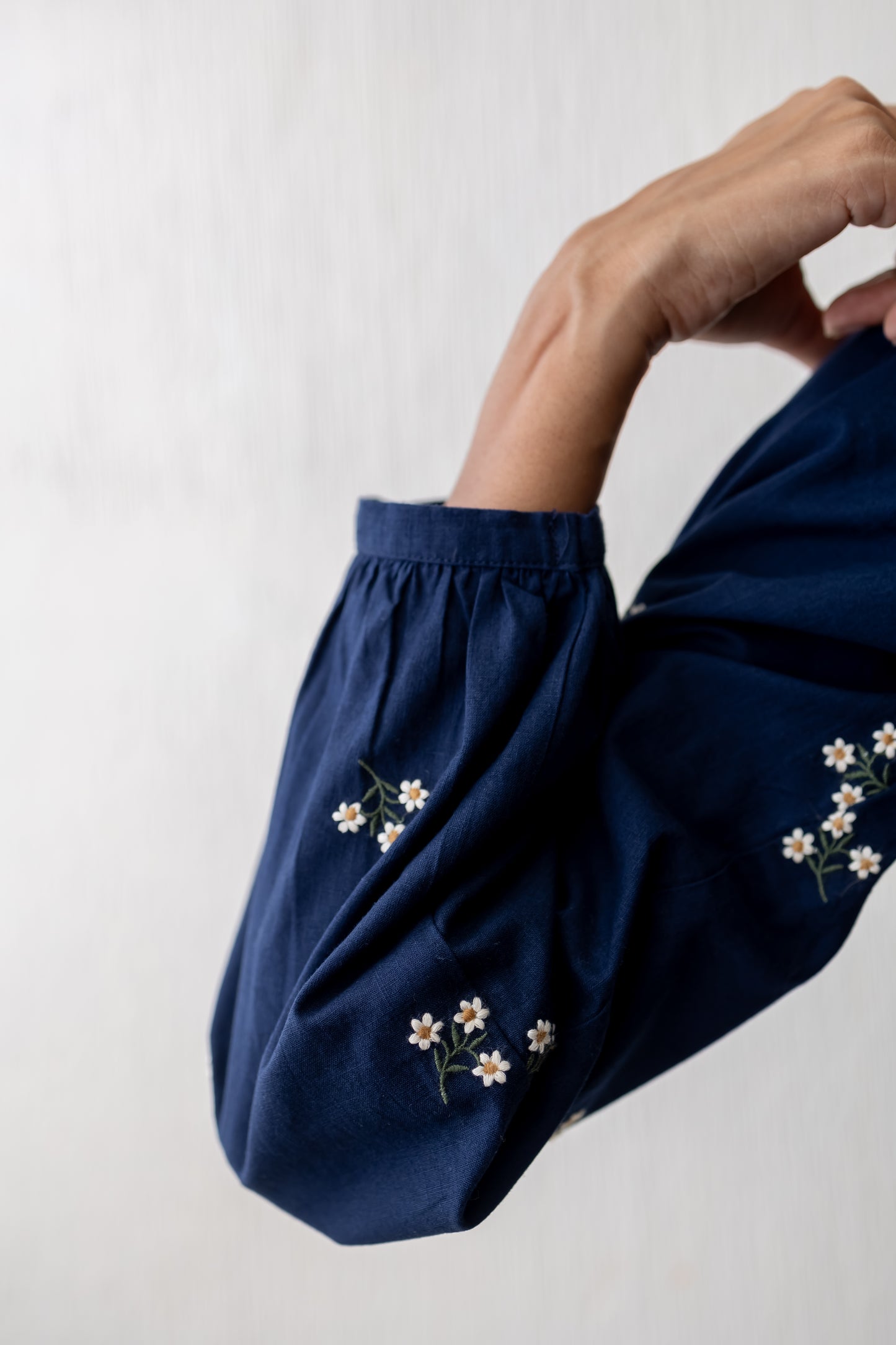 Kayla navy blue wide neck floral embroidery top